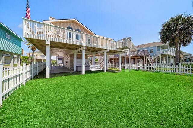 22321 Vista Del Mar, Galveston, TX 77554 - back of property with a wooden deck