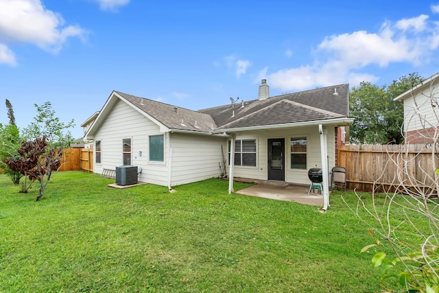 16310 Autumn Leigh Dr, Houston, TX 77083 - rear view of house with a patio, a chimney, roof with shingles, and cooling unit