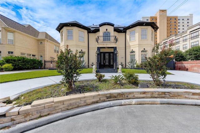 5302 Val Verde St, Houston, TX 77056 - view of front of home with roof mounted solar panels and french doors