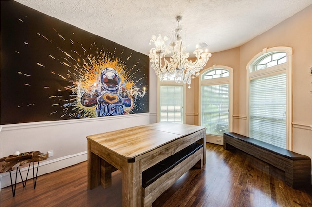 5302 Val Verde St, Houston, TX 77056 - dining space with wood finished floors, a chandelier, and a textured ceiling