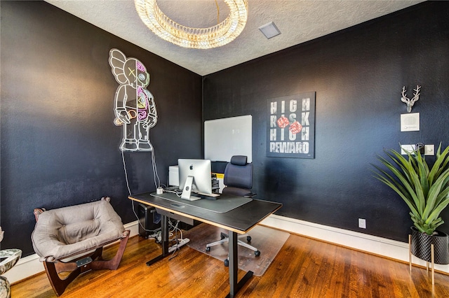 5302 Val Verde St, Houston, TX 77056 - office space featuring wood finished floors, baseboards, a textured ceiling, and vaulted ceiling