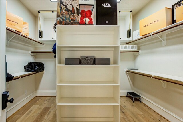 5302 Val Verde St, Houston, TX 77056 - walk in closet with wood finished floors