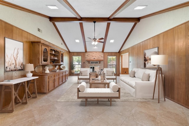 534 W Hufsmith Rd, Tomball, TX 77375 - living area featuring wooden walls, a ceiling fan, and a brick fireplace