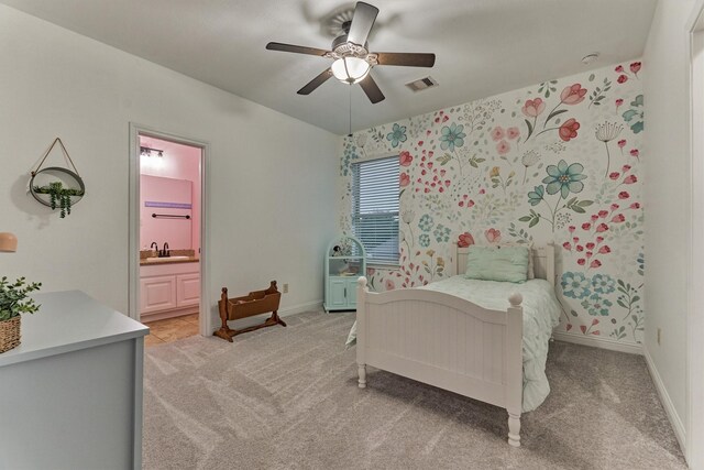 21603 Fairhaven Creek Dr, Cypress, TX 77433 - bedroom featuring light colored carpet, ensuite bath, a ceiling fan, baseboards, and a sink