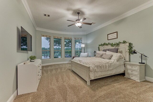 21603 Fairhaven Creek Dr, Cypress, TX 77433 - bedroom featuring light carpet, crown molding, baseboards, and a ceiling fan