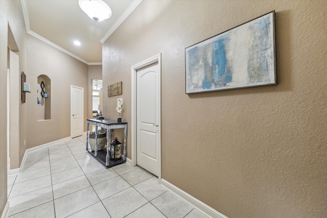 4914 Mountain Maple Trl, Rosenberg, TX 77471 - corridor featuring ornamental molding, light tile patterned floors, and baseboards