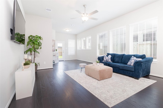 7334 Lake Arrowhead Ln, Porter, TX 77365 - living room featuring baseboards, a ceiling fan, and dark wood finished floors