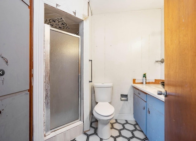 701 Alamo St, El Campo, TX 77437 - full bathroom featuring a stall shower, toilet, and vanity
