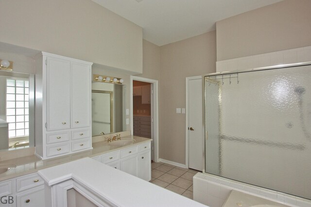 918 Longview Dr, Sugar Land, TX 77478 - full bathroom with vanity, a stall shower, and tile patterned floors