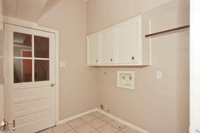 918 Longview Dr, Sugar Land, TX 77478 - laundry room featuring cabinet space, washer hookup, light tile patterned floors, baseboards, and electric dryer hookup