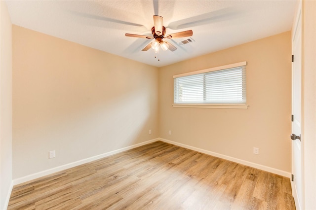 2525 29th Ave N, Texas City, TX 77590 - empty room featuring light wood-type flooring, baseboards, and ceiling fan