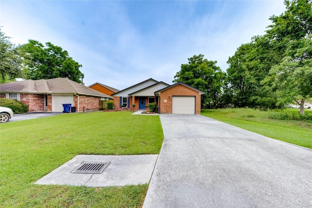 2525 29th Ave N, Texas City, TX 77590 - single story home featuring a garage, brick siding, a front yard, and driveway