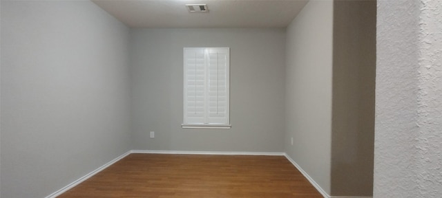 2518 Skyview Cove Ct, Houston, TX 77047 - spare room featuring wood finished floors and baseboards