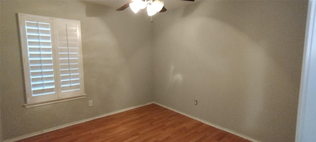 2518 Skyview Cove Ct, Houston, TX 77047 - empty room with a ceiling fan, wood finished floors, and baseboards
