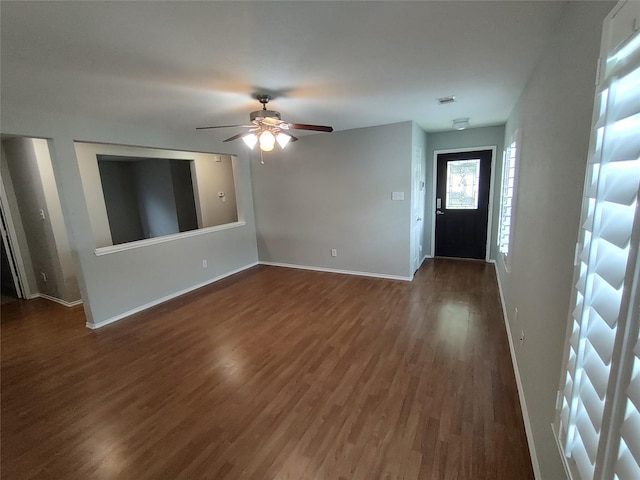 2518 Skyview Cove Ct, Houston, TX 77047 - entryway featuring dark wood-style flooring, baseboards, and ceiling fan