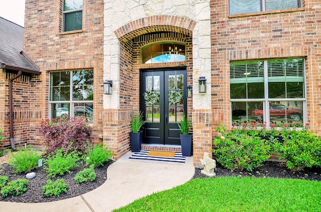 4511 Wickby St, Fulshear, TX 77441 - entrance to property featuring french doors and brick siding