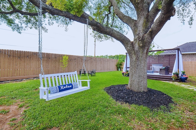 4511 Wickby St, Fulshear, TX 77441 - fenced backyard featuring a deck