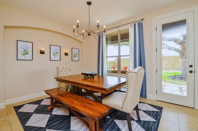 4511 Wickby St, Fulshear, TX 77441 - dining area with light tile patterned flooring and a chandelier