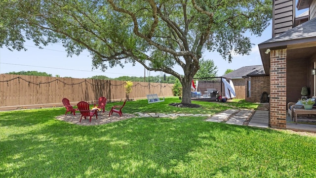 4511 Wickby St, Fulshear, TX 77441 - view of yard with a patio and an outdoor fire pit