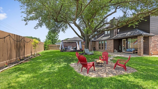 4511 Wickby St, Fulshear, TX 77441 - view of yard with an outdoor fire pit and a gazebo