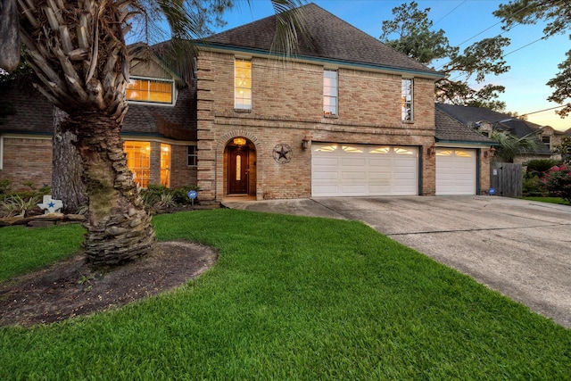 5718 Glenmere Ln, Spring, TX 77379 - view of front facade featuring brick siding, concrete driveway, a garage, and a shingled roof