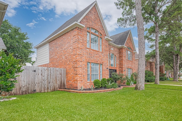 5722 Henniker Dr, Houston, TX 77041 - view of front of home with brick siding and a shingled roof