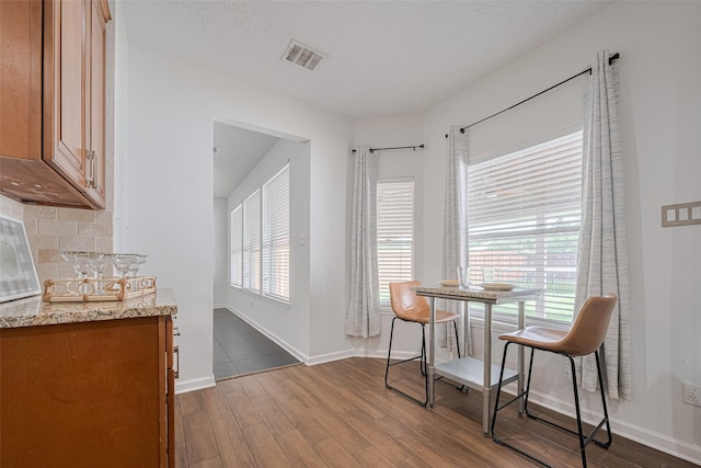 5722 Henniker Dr, Houston, TX 77041 - dining room featuring wood finished floors and baseboards