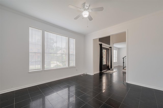 5722 Henniker Dr, Houston, TX 77041 - spare room featuring crown molding, baseboards, and ceiling fan
