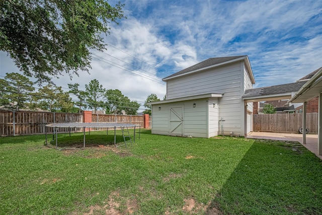 5722 Henniker Dr, Houston, TX 77041 - view of yard with a trampoline and a patio