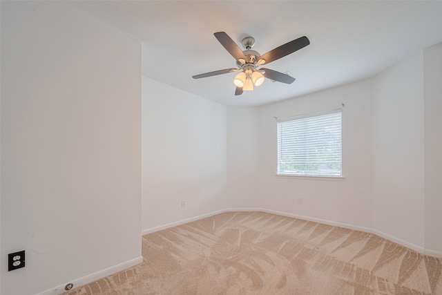 5722 Henniker Dr, Houston, TX 77041 - empty room featuring light colored carpet, baseboards, and ceiling fan