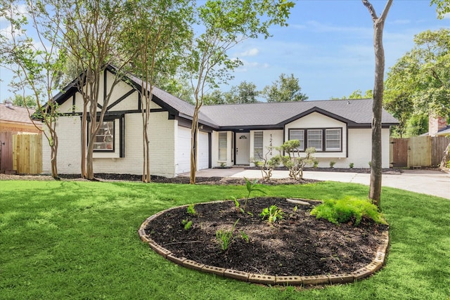 12414 Whittington Dr, Houston, TX 77077 - view of front of home featuring brick siding and a garage