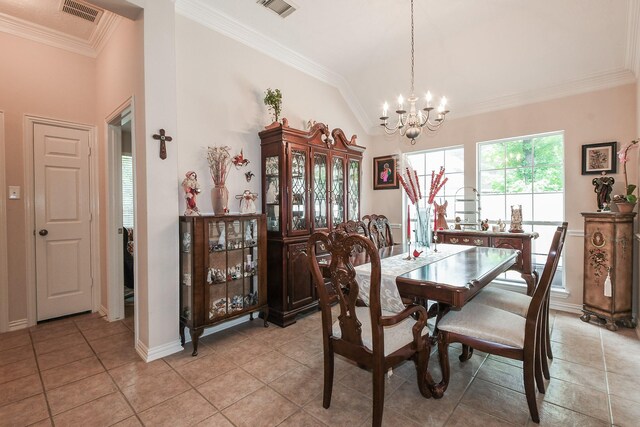 2 Camborn Pl, The Woodlands, TX 77384 - dining area featuring a chandelier, ornamental molding, light tile patterned floors, and lofted ceiling