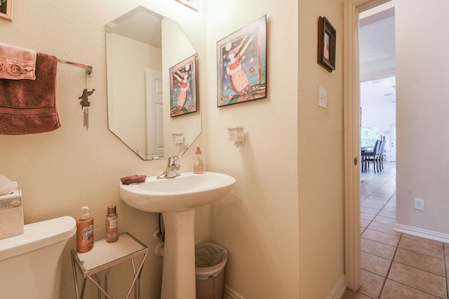 2 Camborn Pl, The Woodlands, TX 77384 - half bath with tile patterned floors and toilet