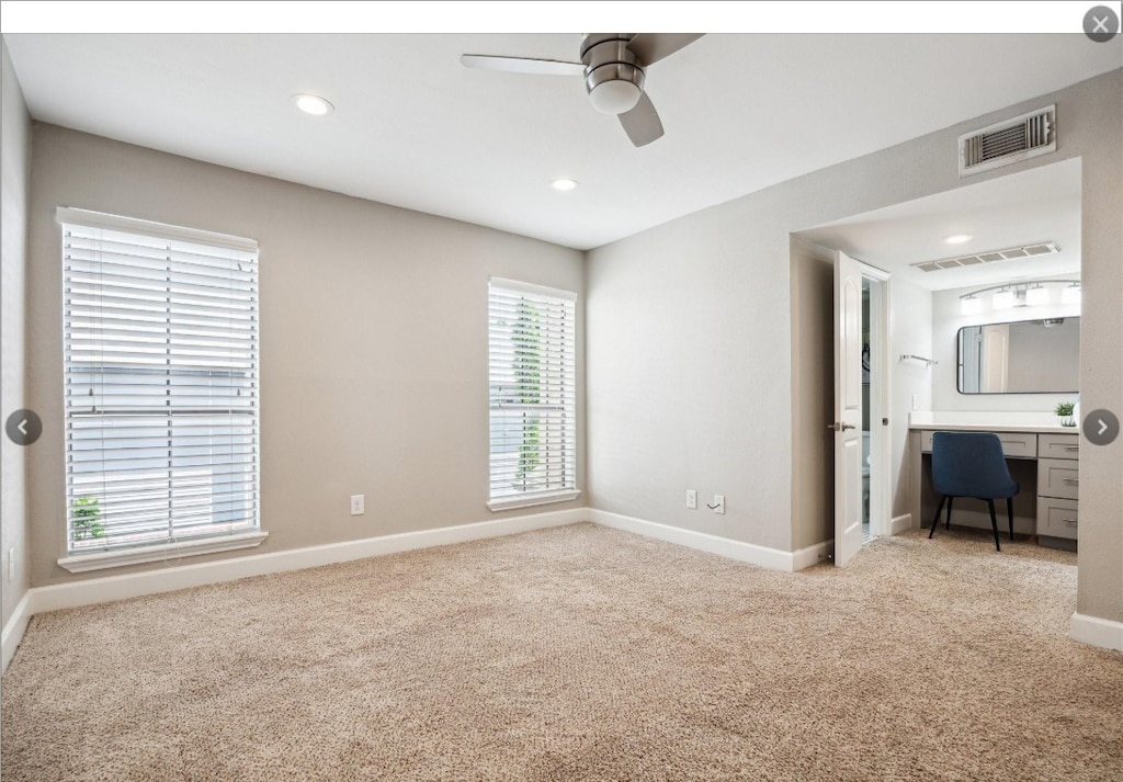 1201 Mcduffie St Unit 122, Houston, TX 77019 - unfurnished bedroom featuring carpet floors, recessed lighting, a desk, and ceiling fan