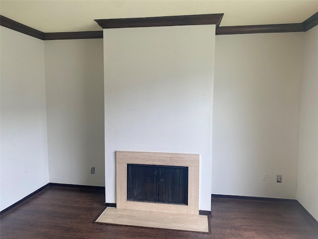 1201 Mcduffie St Unit 122, Houston, TX 77019 - unfurnished living room with crown molding, wood finished floors, and a fireplace