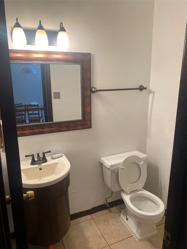 1201 Mcduffie St Unit 122, Houston, TX 77019 - bathroom featuring toilet and tile patterned floors