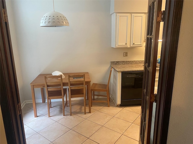 1201 Mcduffie St Unit 122, Houston, TX 77019 - dining space with light tile patterned floors