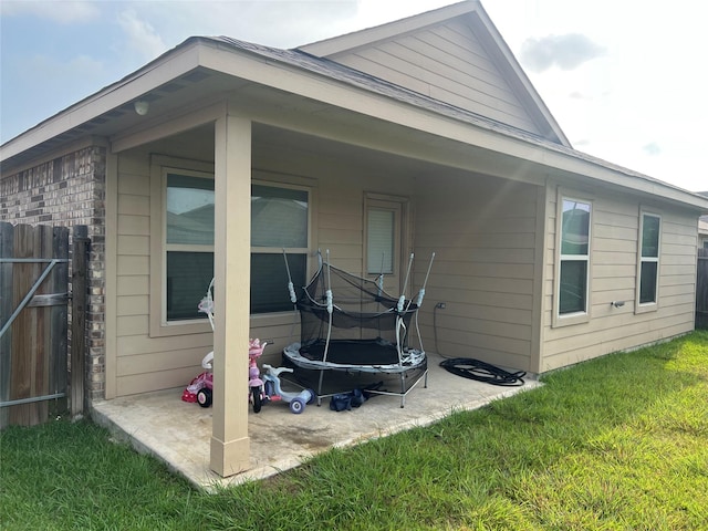 15466 Sicomoro Viejo St, Channelview, TX 77530 - view of home's exterior with a patio area