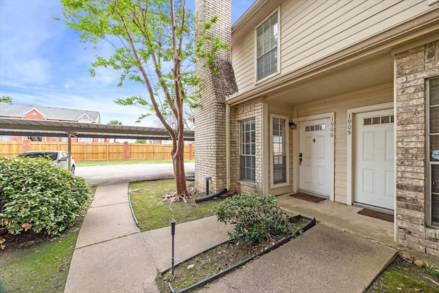7575 Cambridge St Unit 1906, Houston, TX 77054 - doorway to property featuring a chimney
