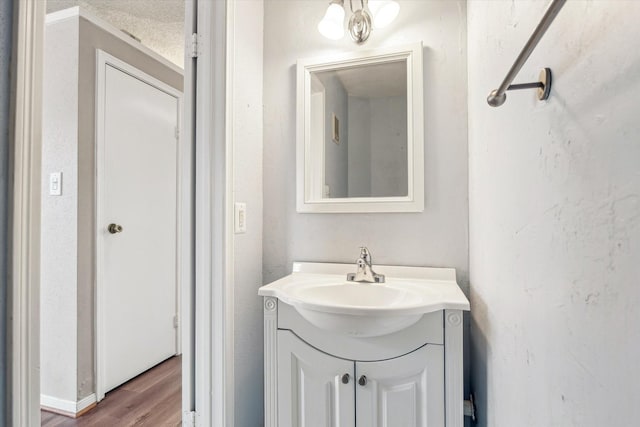 7575 Cambridge St Unit 1906, Houston, TX 77054 - bathroom featuring vanity and wood finished floors