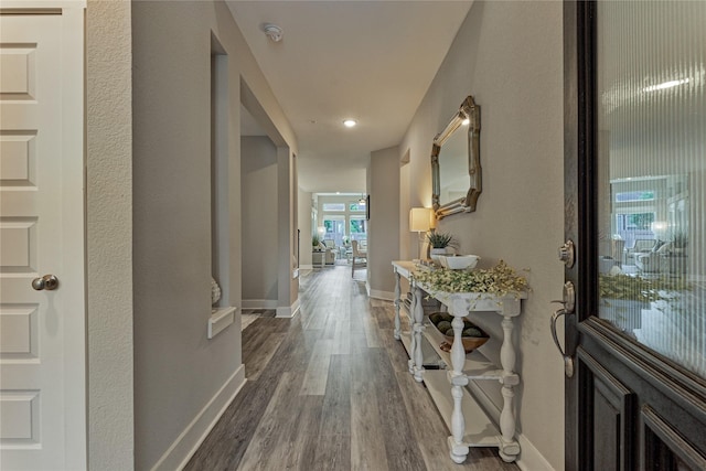 127 Kingsley Grove St, Montgomery, TX 77316 - hallway featuring dark wood-style flooring, baseboards, and recessed lighting