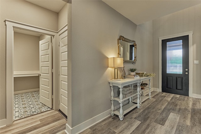 127 Kingsley Grove St, Montgomery, TX 77316 - entryway with wood finished floors and baseboards
