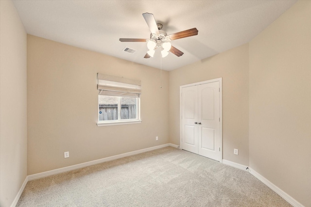 28314 Shining Creek Ln, Spring, TX 77386 - unfurnished bedroom featuring carpet flooring, a closet, and baseboards