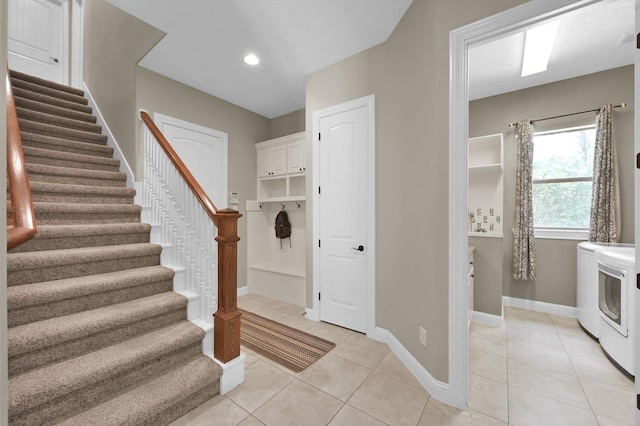 11415 W Kristina Cir, Montgomery, TX 77316 - staircase featuring washing machine and dryer, tile patterned flooring, baseboards, and recessed lighting