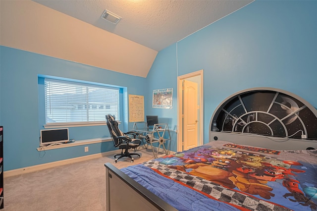 7207 Alder Springs Ct, Katy, TX 77494 - carpeted bedroom featuring vaulted ceiling, baseboards, a desk, and a textured ceiling