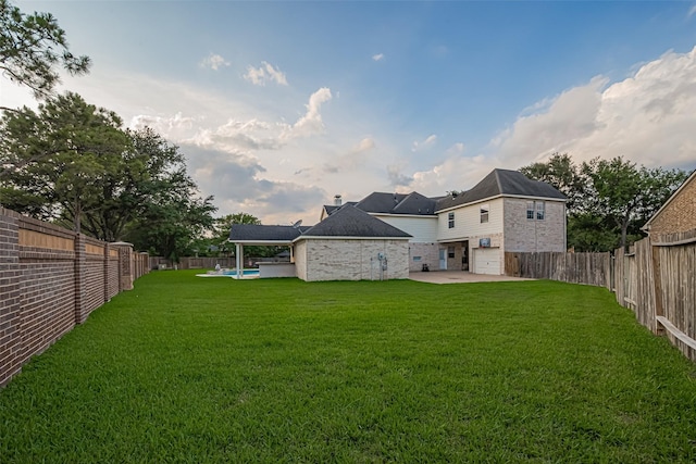7207 Alder Springs Ct, Katy, TX 77494 - view of yard with a patio and an attached garage