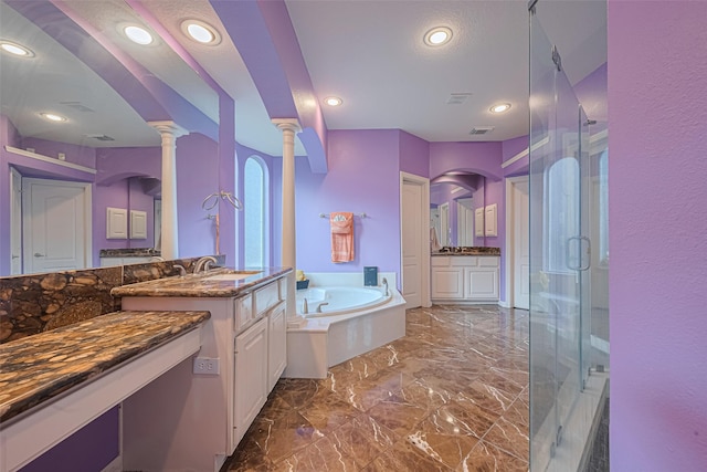 7207 Alder Springs Ct, Katy, TX 77494 - full bath featuring a stall shower, a bath, marble tiled floors, two vanities, and recessed lighting