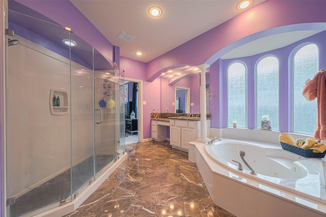 7207 Alder Springs Ct, Katy, TX 77494 - bathroom with ornate columns, vanity, a jetted tub, a stall shower, and marble tiled floors