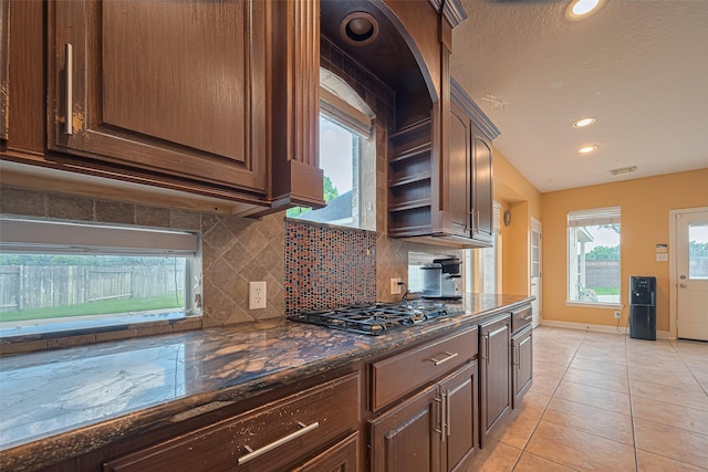 7207 Alder Springs Ct, Katy, TX 77494 - kitchen featuring baseboards, backsplash, black gas cooktop, recessed lighting, and light tile patterned flooring