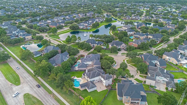7207 Alder Springs Ct, Katy, TX 77494 - aerial overview of property's location featuring nearby suburban area, a large body of water, and a pool